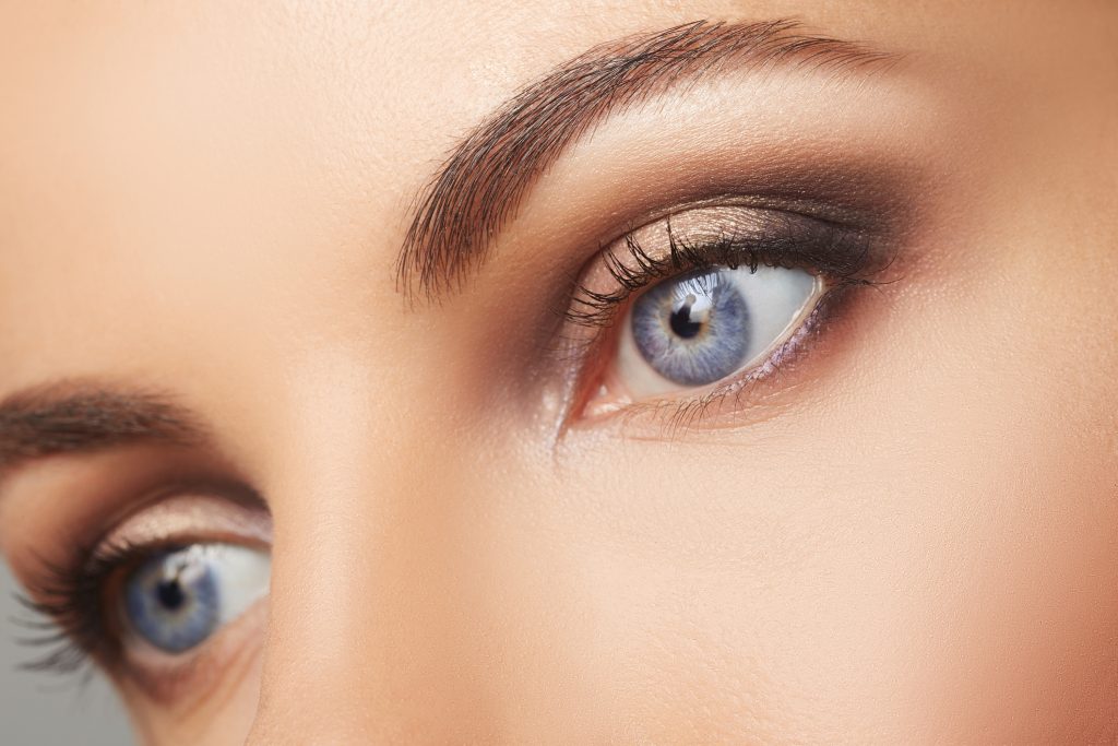 close up of young woman's blue eyes