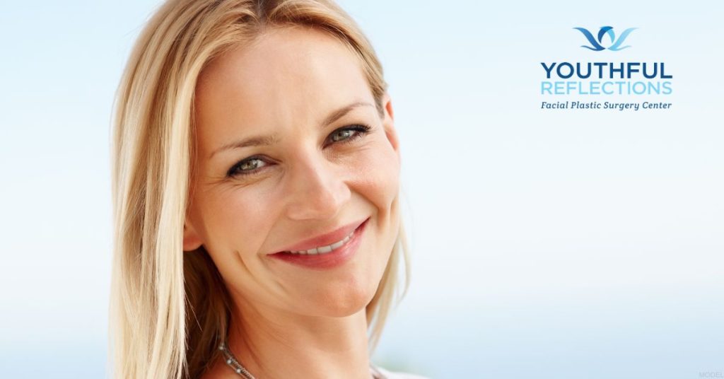 Woman with refreshed appearance after facelift (model)